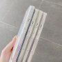 Zaščitni etui s teksturo školjke za iPhone 12 / 12 Pro - črna